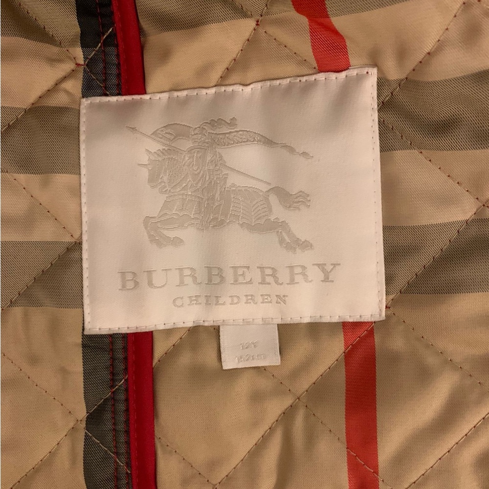 Burberry red kid’s coat.
